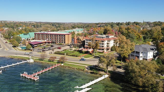 Aerial view of Bella Vista Suites on the Lake Geneva shoreline in autumn